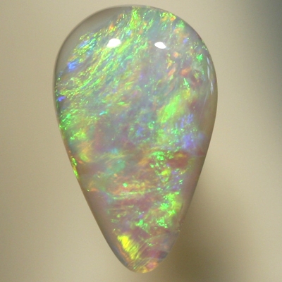 SOLID SEMI BLACK OPAL Orange and green swirls of fire, always showing colour